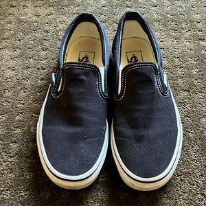 Vans black slip ons